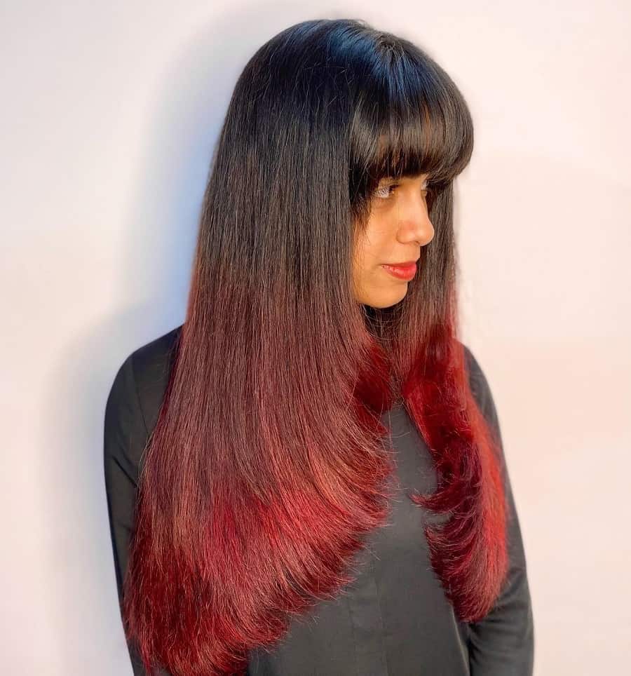 red balayage hair with bangs