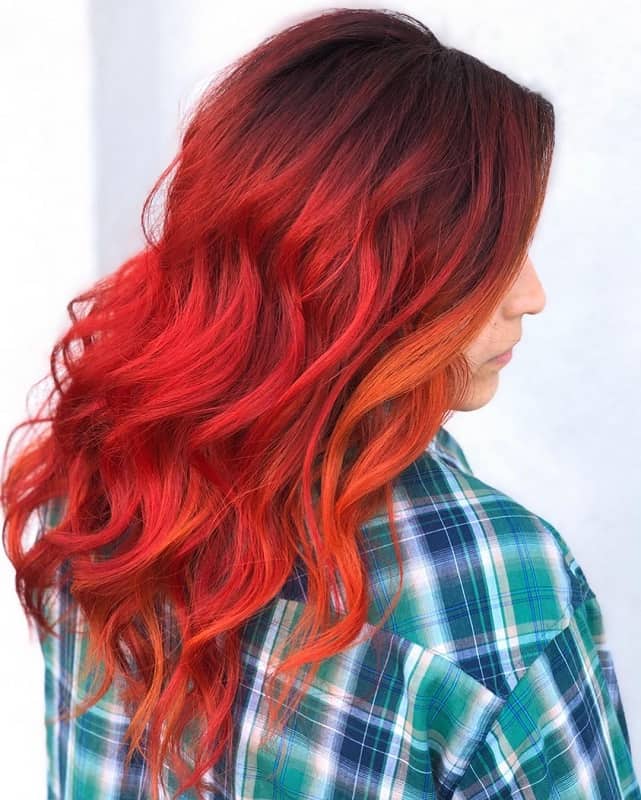 red balayage on dark hair