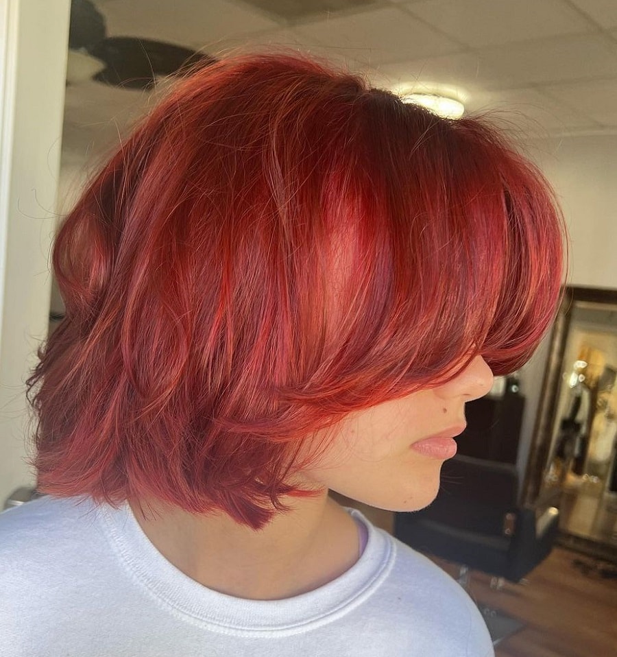red bob with feathered bangs