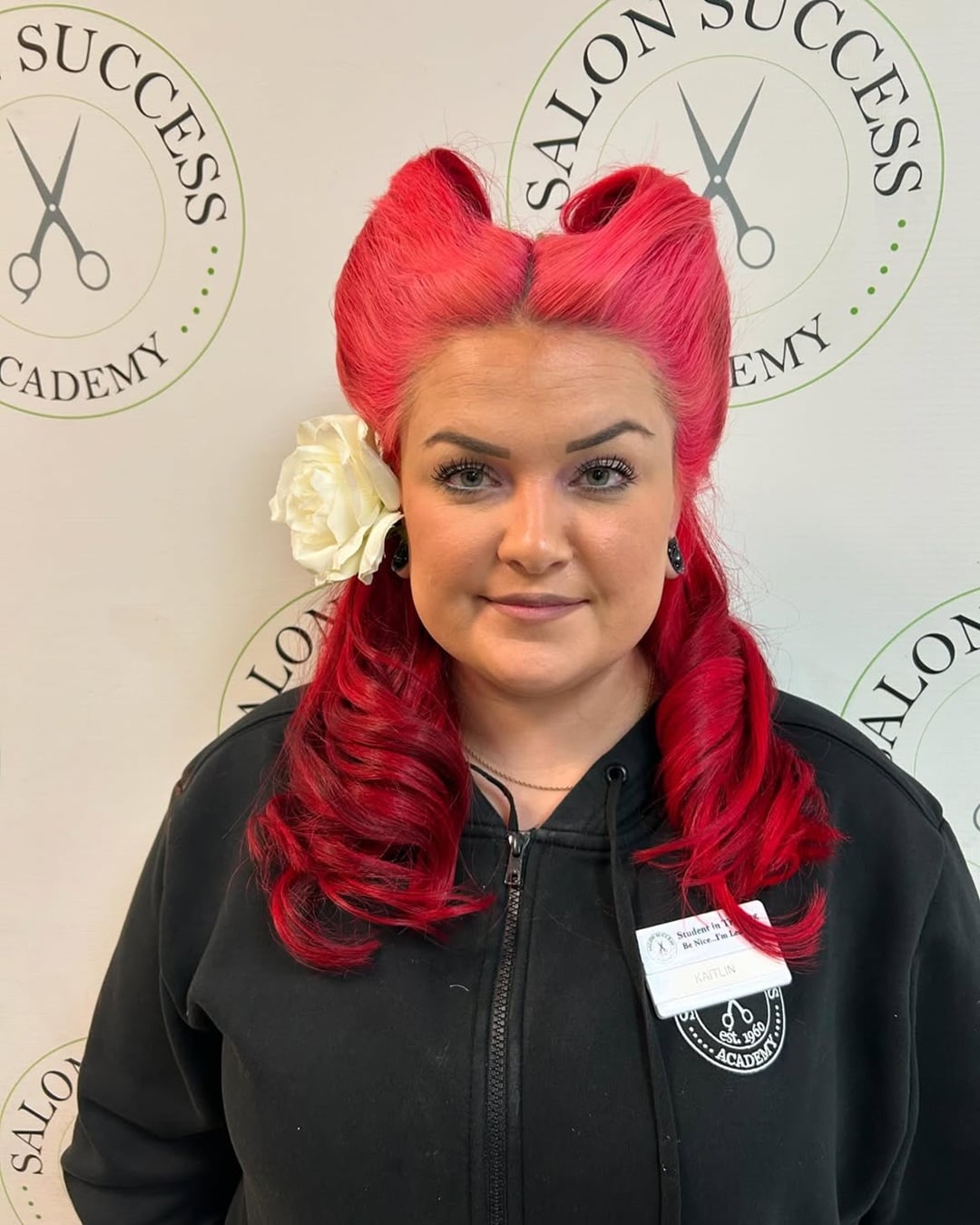 Red victory rolls rockabilly hairstyle