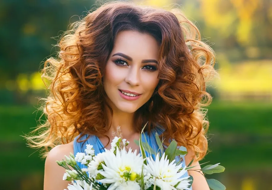 redhead bridesmaid hairstyle with long curly hair