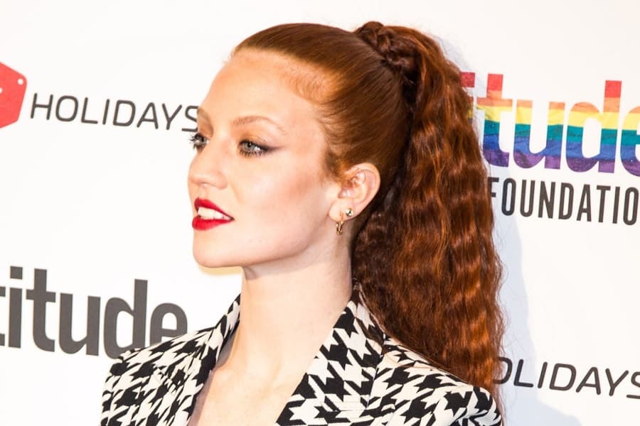 redhead celebrity with curly ponytail-Jess Glynne