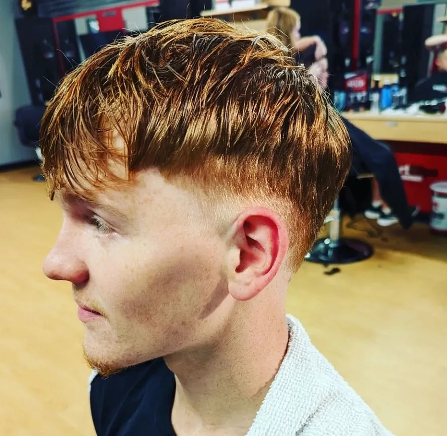 redhead guy with mushroom haircut