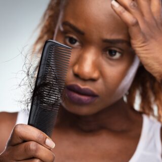 fixing relaxed hair breakage
