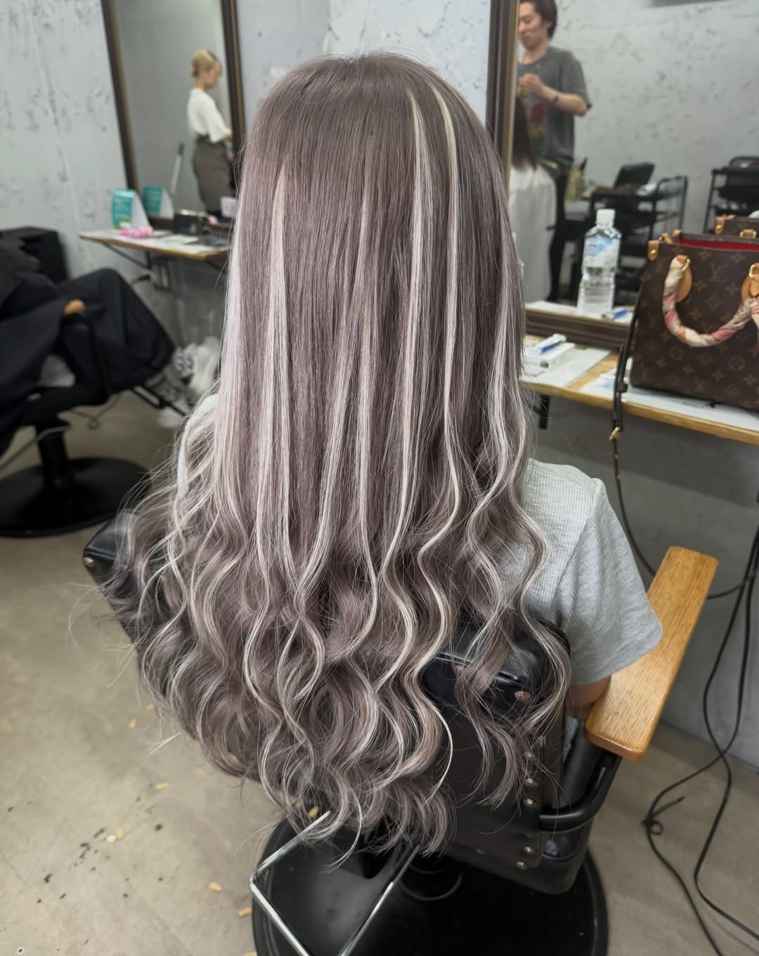 Long wavy smoky brown hair with ribbon silver highlights