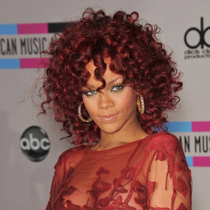 rihanna with short curly red hair