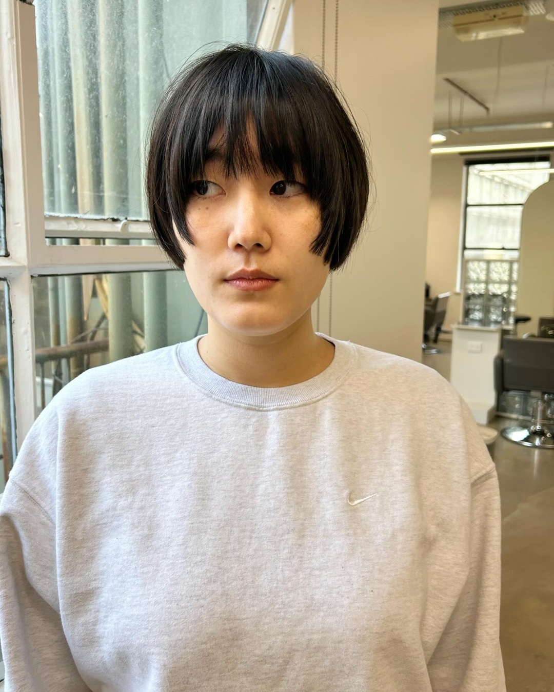 dark rounded bob bowl cut with bangs