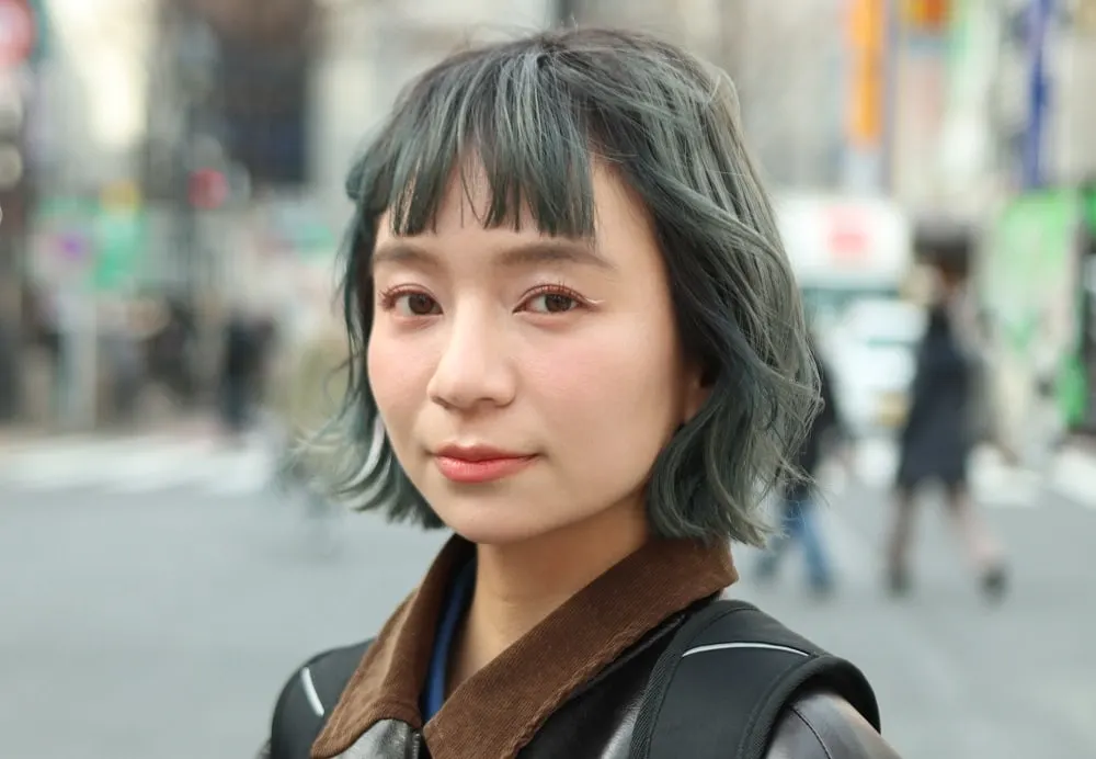 salt and pepper hair with bangs