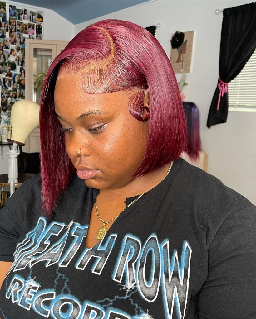 sew in burgundy bob with deep side part