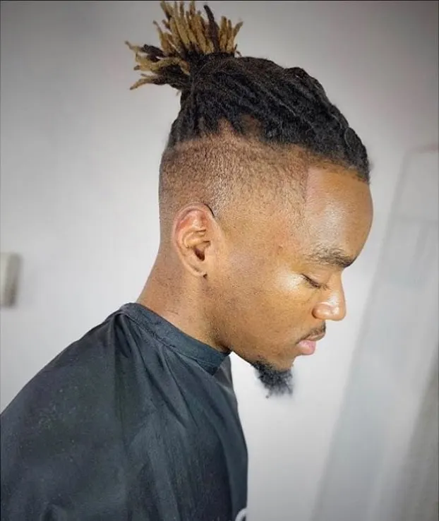 dreads ponytail with shadow fade