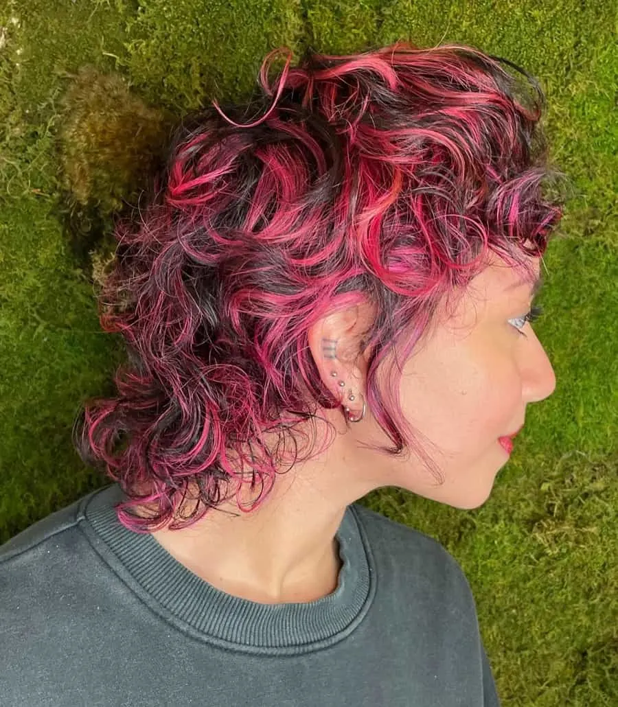 shaggy hair with pink highlights