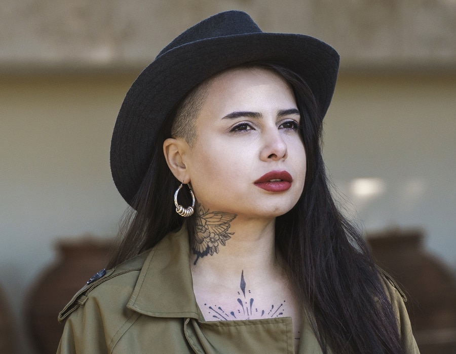 shaved hairstyle with cowboy hat