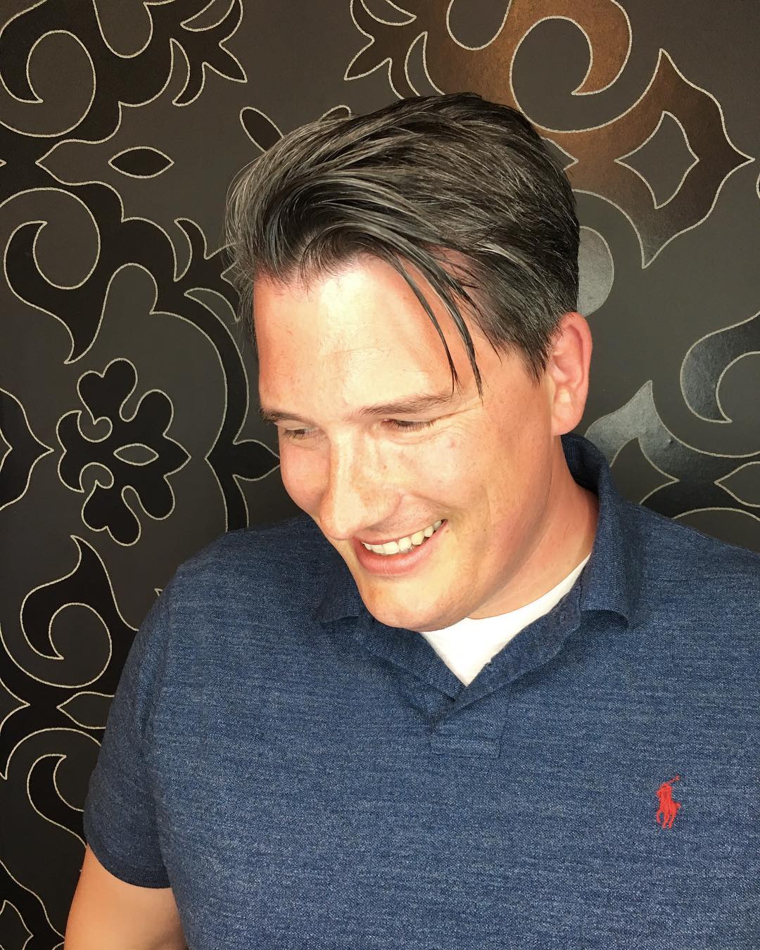 short slicked-back 1950s greaser haircut