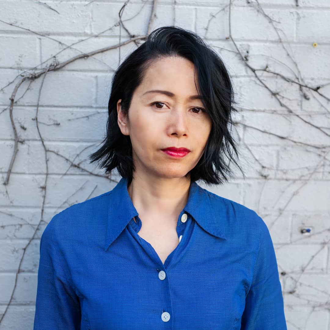 short textured Asian bob with side-swept bangs