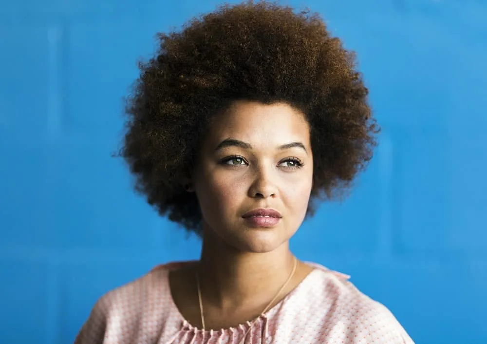 short afro hairstyle for black women with round face