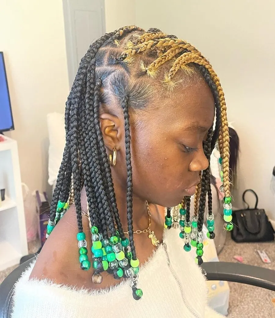 short black and blonde knotless braids with beads