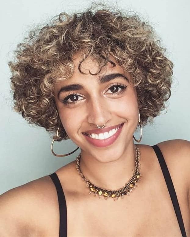 short blonde curly hair with bangs