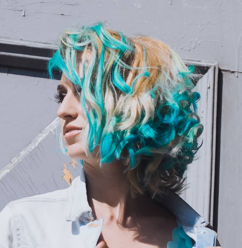 short blonde hair with blue highlights
