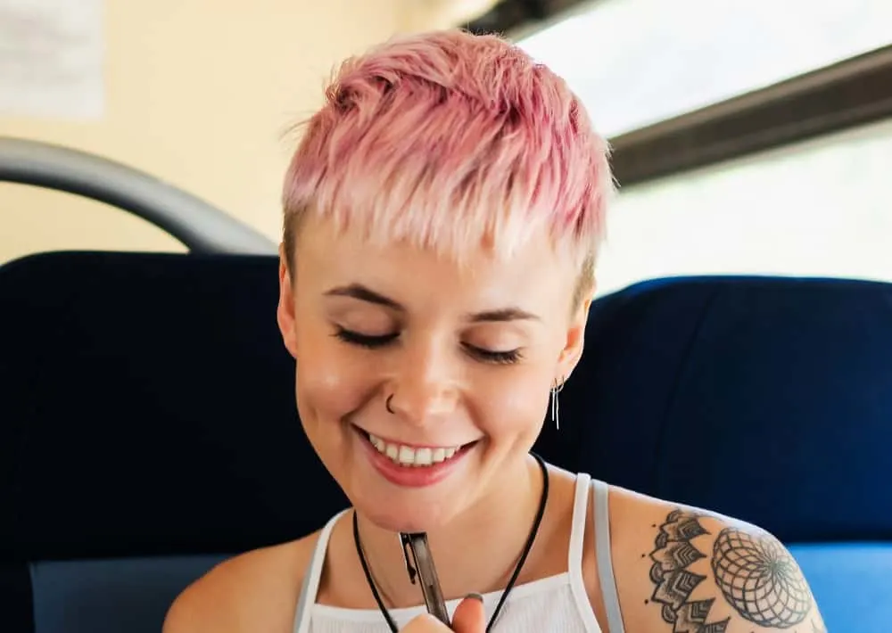 short blonde hair with pink frosted highlights