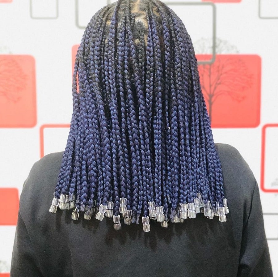 short blue knotless braids with beads