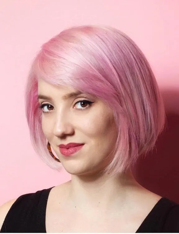 short pink angled bob with bangs