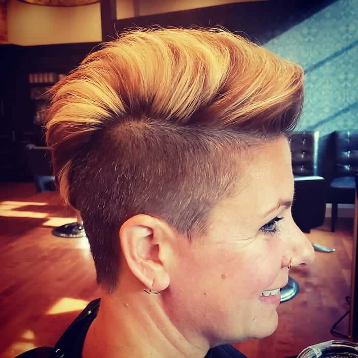 short brown undercut with blonde highlights
