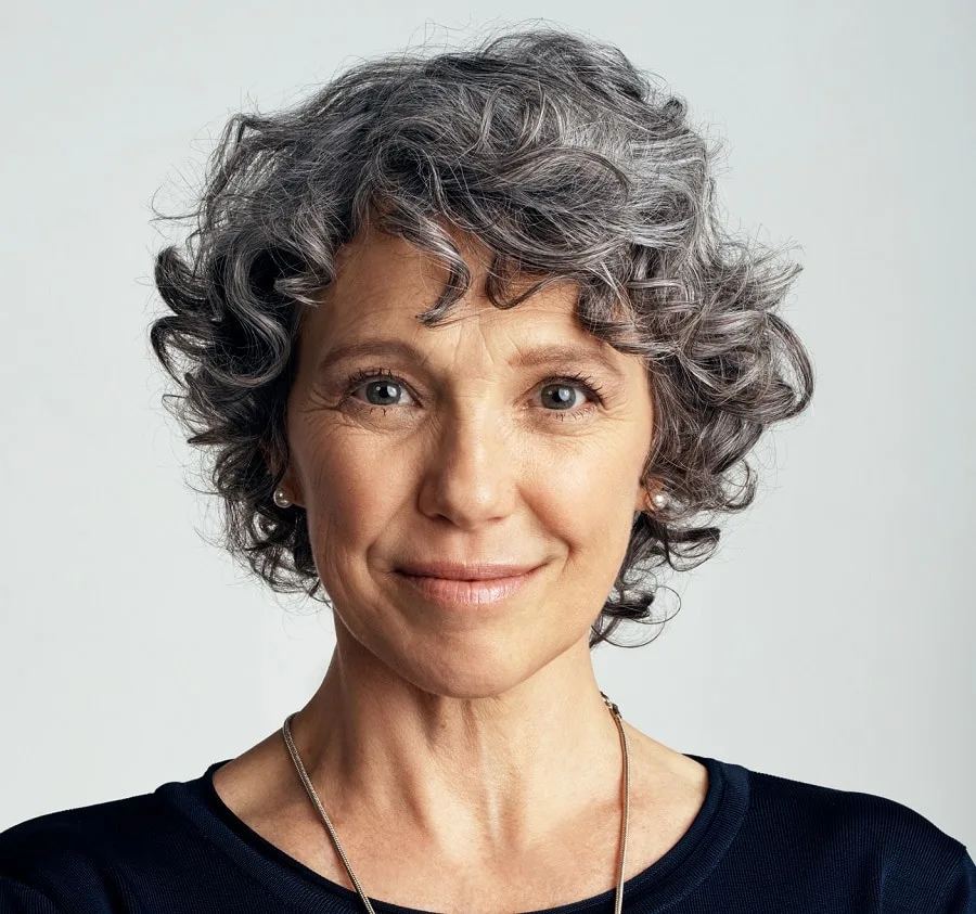 short choppy curly hairstyle for over 50