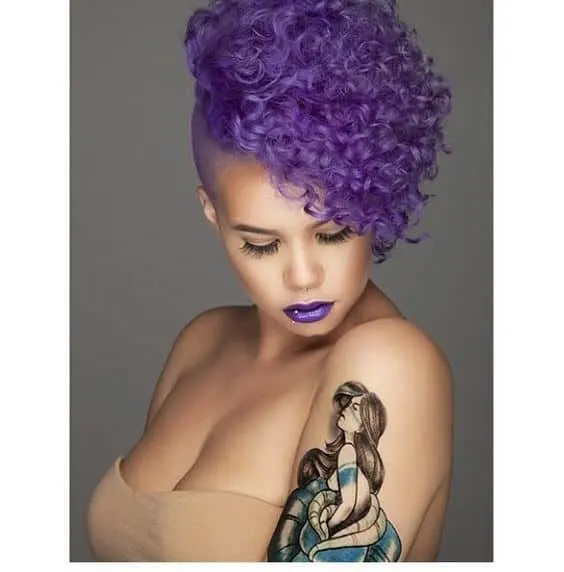 tight curly hair with vibrant purple color