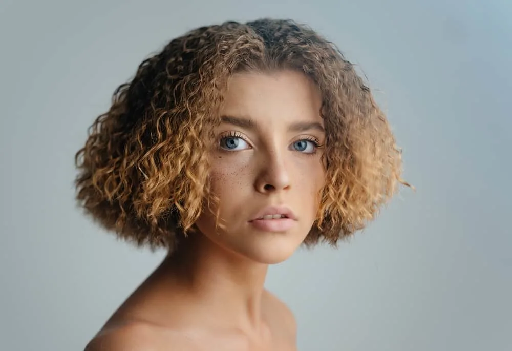 short curly bob with middle part