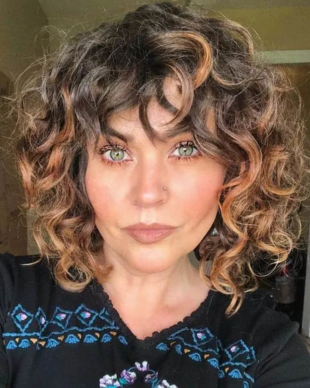 short curly bob with bangs