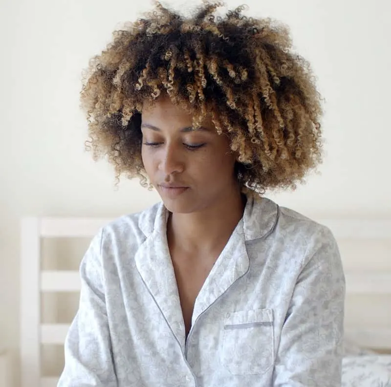 short curly hair with blonde highlights