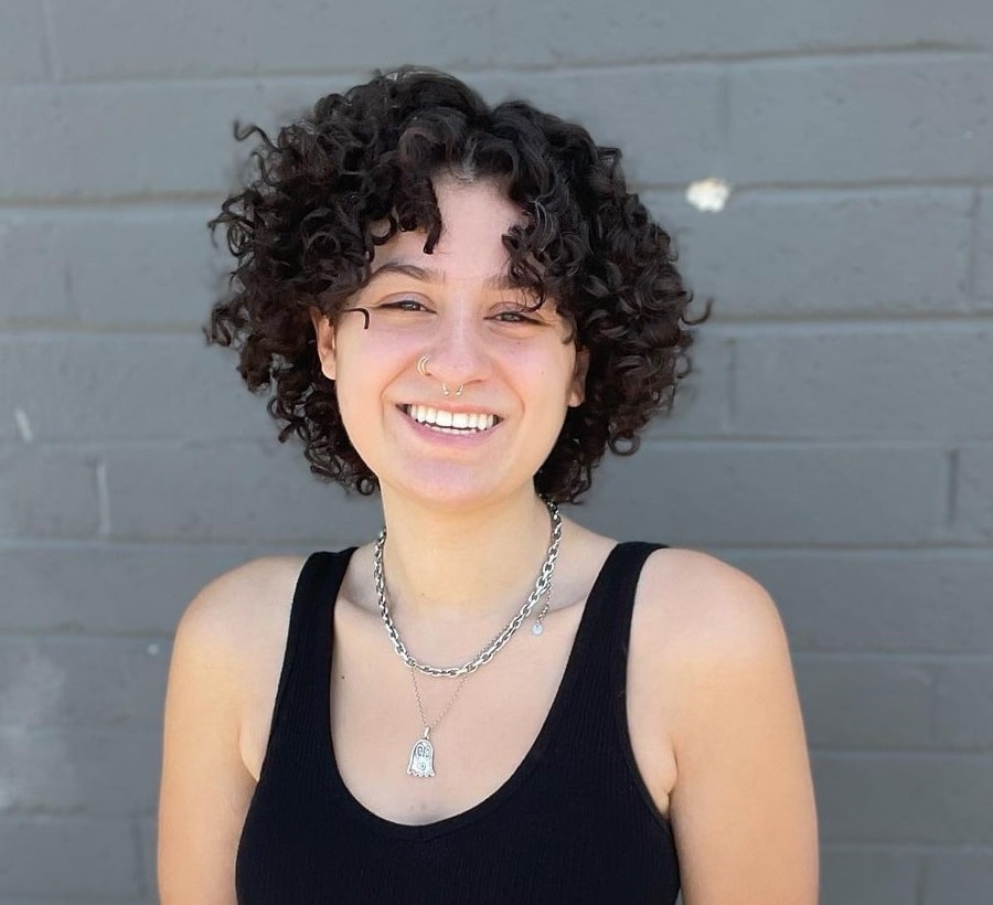 short curly hair with curtain bangs