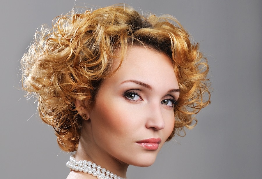 10 Versatile Curly Hairstyles for Big Foreheads – HairstyleCamp