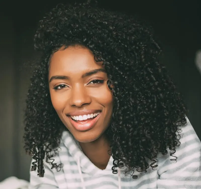 black woman with short curly hair