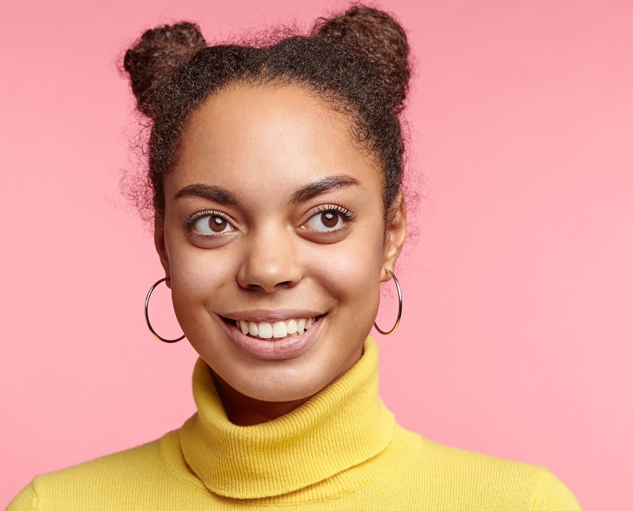 Short curly space buns for women with round faces