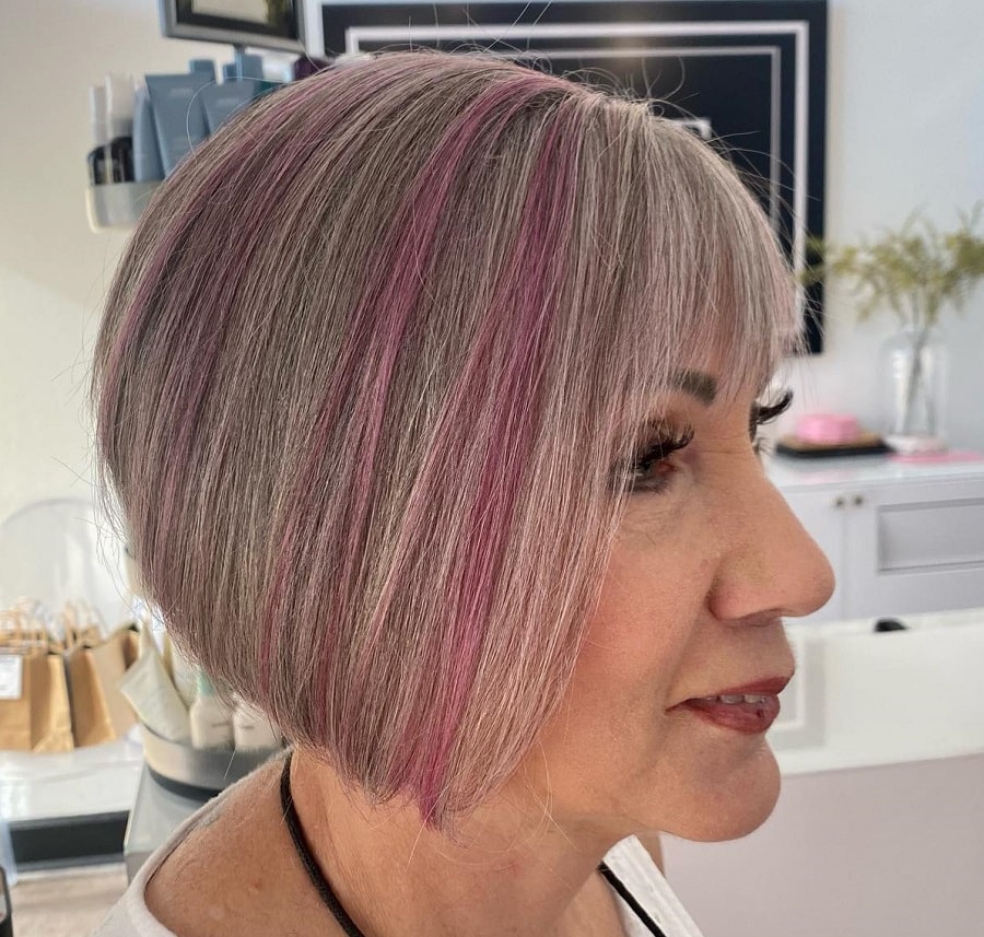 short gray hair with pink highlights
