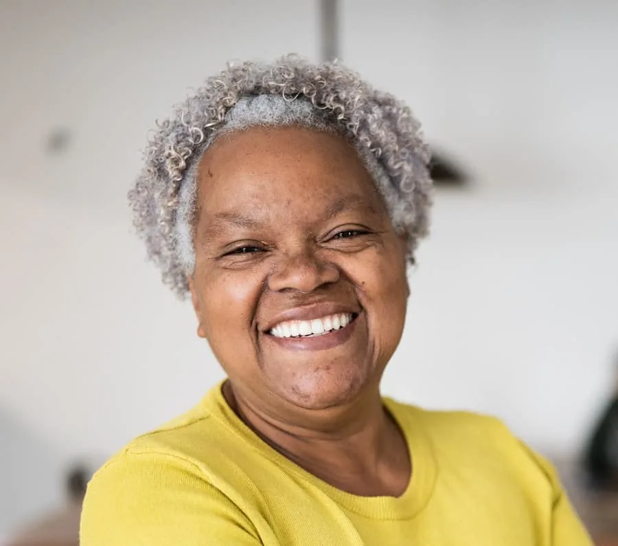 short grey afro hairstyle with headband