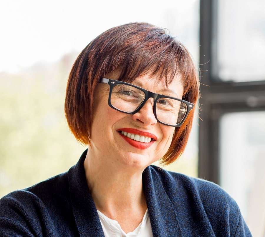 short hair with bangs for women over 50 with glasses