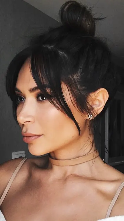 short hair bun with side bangs