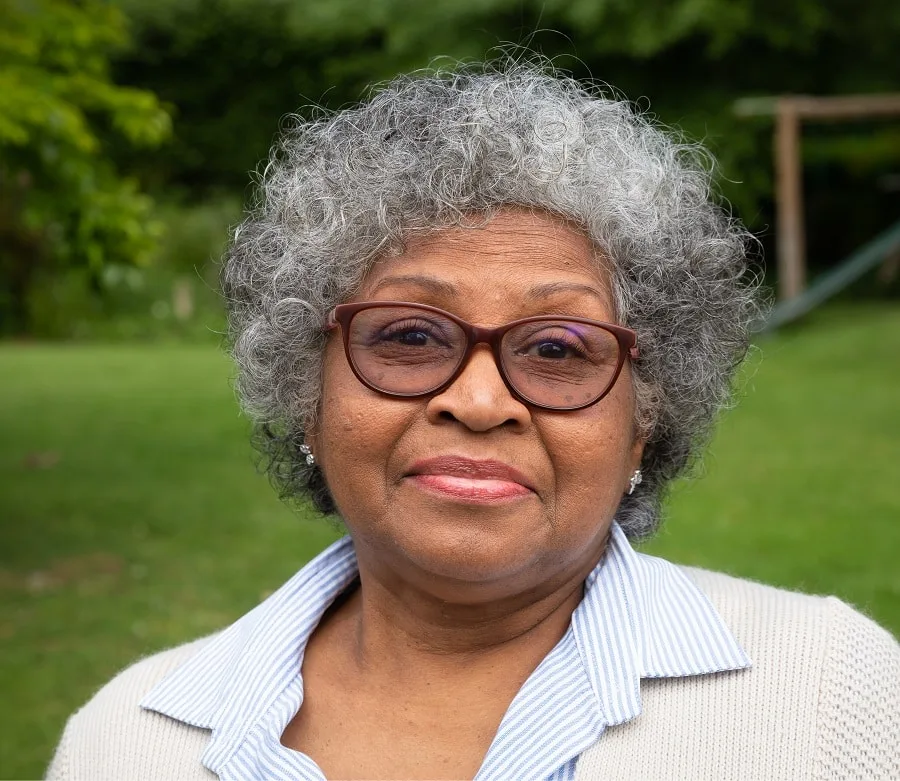 short hairstyle for black women over 50 with glasses