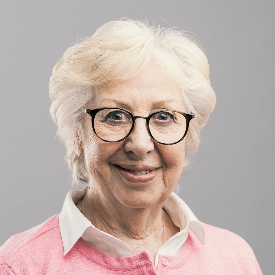 short hairstyle for oval faced women over 70 with glasses