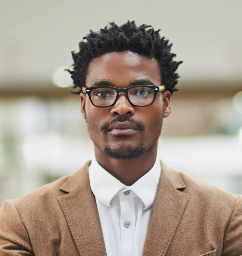 short hairstyle for professional black men with glasses