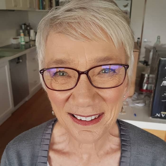 short hair with baby bangs for women over 50 with glasses