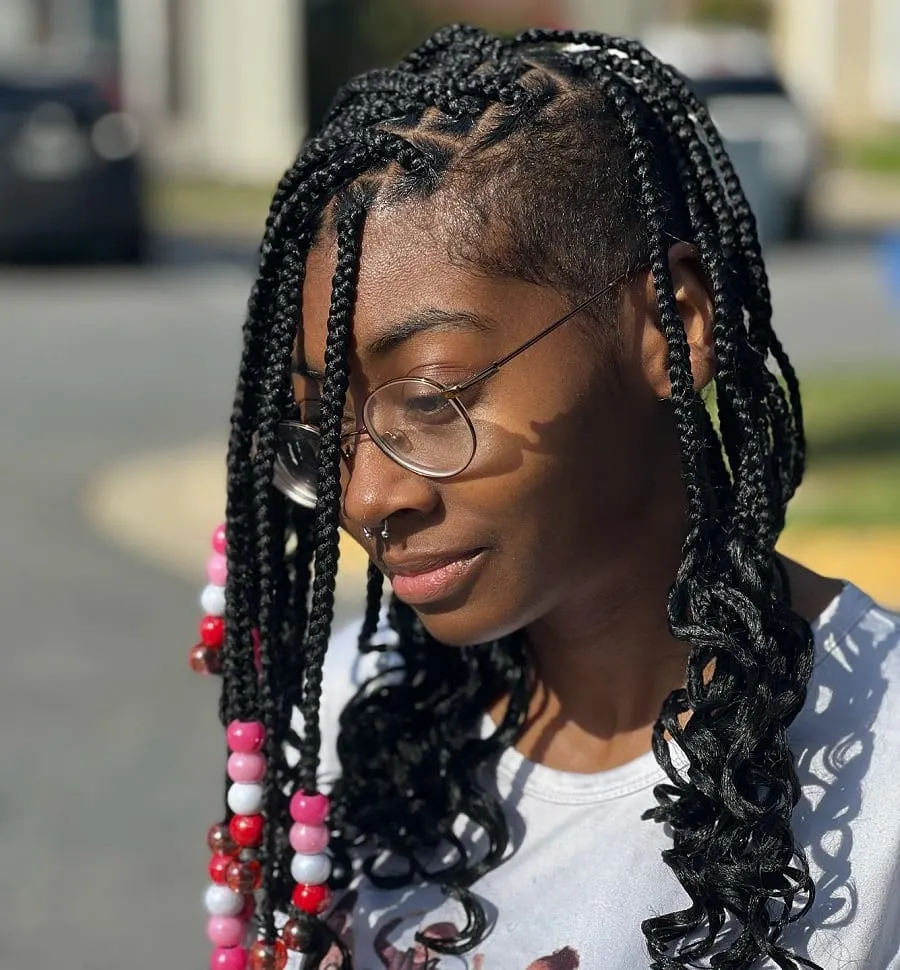 short knotless braids and beads with curly ends