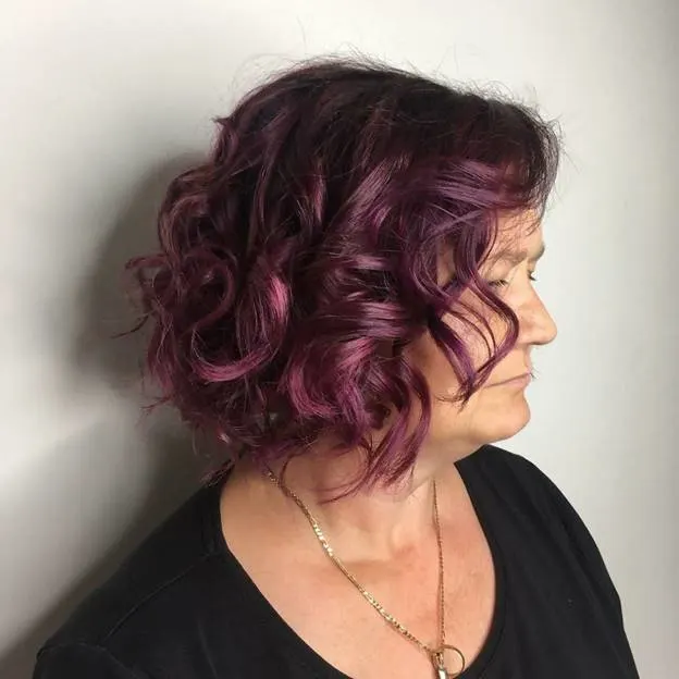 short curly purple bob with layers