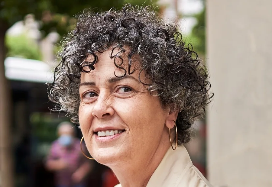 short layered curly hairstyle for women over 60