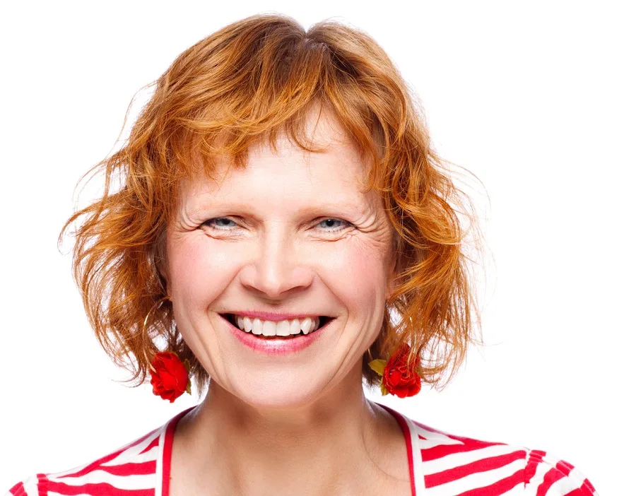 short layered red wavy bob for women over 50