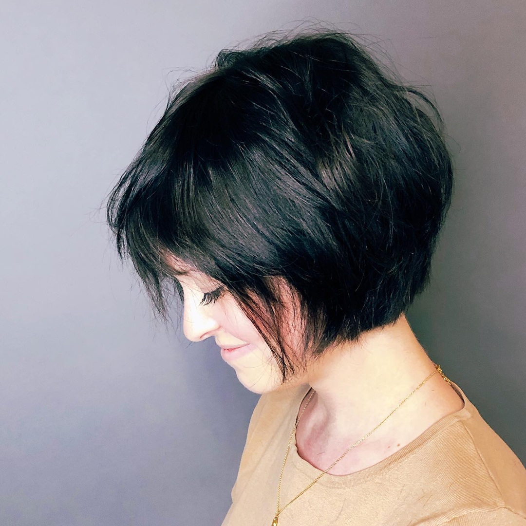 textured dark brown stacked bob with bangs