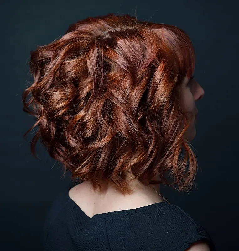 short loose curls with middle part