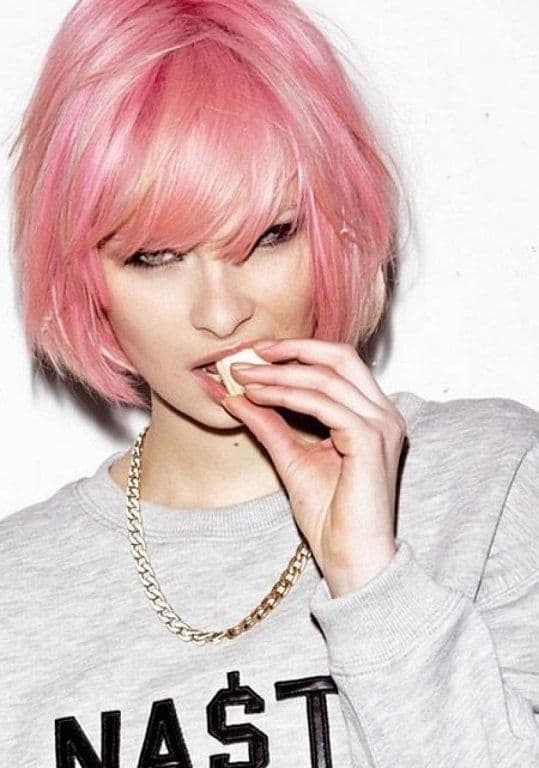 messy short pink hair with full bangs